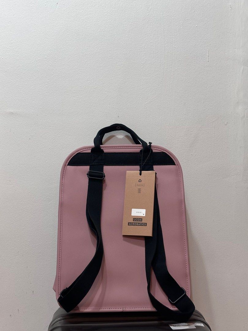 Laptop Bag Medium Backpack Rose Pink (Category: Laptop Bags & Sleeves) located in Singapore. Submitted by dejavu_3023 (Listing ID 1372111869, Image 2). Description: * Waterproof. Main compartment closes with water repellent zipper * Exterior pocket on the front closes with magnets * Two mesh interior pockets e.g. for cell phone, wallet or cable * Elastic band bottle holder and key strap inside * Laptop compartment: 26 x 33 cm * Fits Up to 13” Mac