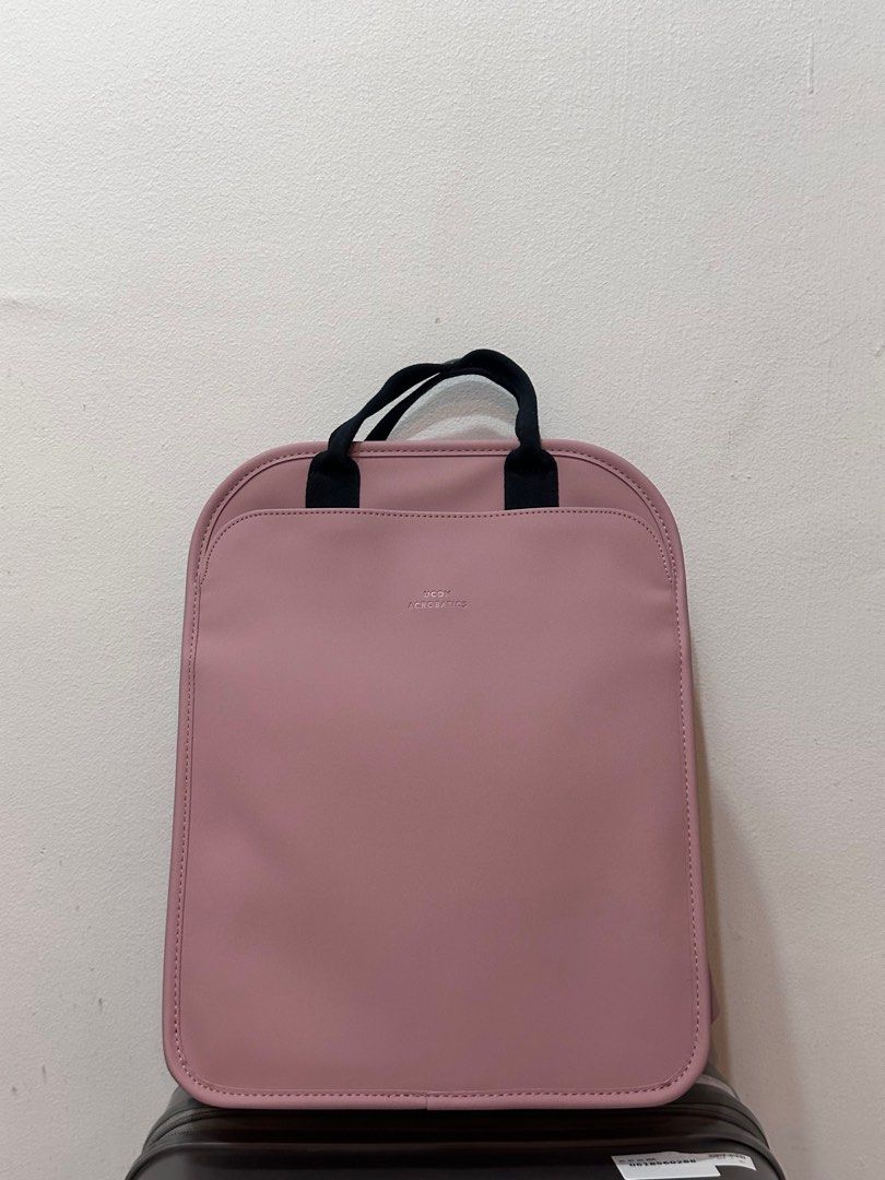 Laptop Bag Medium Backpack Rose Pink (Category: Laptop Bags & Sleeves) located in Singapore. Submitted by dejavu_3023 (Listing ID 1372111869, Image 1). Description: * Waterproof. Main compartment closes with water repellent zipper * Exterior pocket on the front closes with magnets * Two mesh interior pockets e.g. for cell phone, wallet or cable * Elastic band bottle holder and key strap inside * Laptop compartment: 26 x 33 cm * Fits Up to 13” Mac