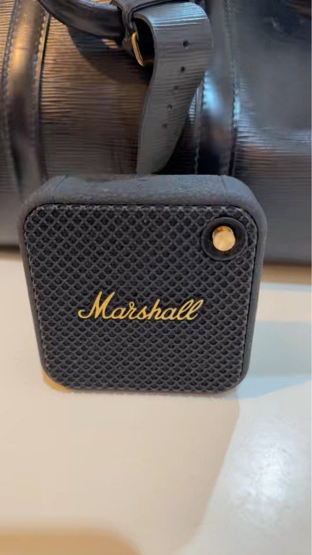 Marshall Willen Bluetooth Speaker - Black (Category: Soundbars, Speakers & Amplifiers) located in Singapore. Submitted by jedmontecarlo (Listing ID 1372205377, Image 1). Description: Check out this awesome Marshall Willen speaker! It's a portable Bluetooth speaker that delivers a great sound experience. The speaker is in great condition, and it's perfect for listening to music on the go. The black color gives it a sleek and stylish look. It's a g
