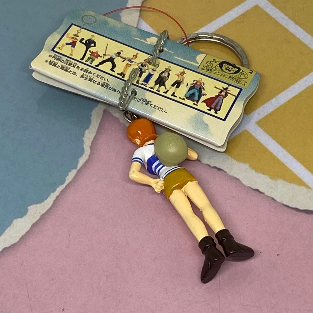 ONE PIECE NAMI FIGURE KEYCHAIN KEY RING (Category: Figurines & Statues) located in Quezon City. Submitted by kitsune.treasures (Listing ID 1372134420, Image 3). Description: 📍Quezon City CONDITION: WHAT YOU SEE IS WHAT YOU GET. Dimensions: Kindly check the photos for the actual measurements. Please check all the photos for the condition of every item/s. SOME OF THE ITEMS HAVE SCRATCHES, PEN MARKS, DISCOLORATION OR PAINT CHIPS Please manage your 