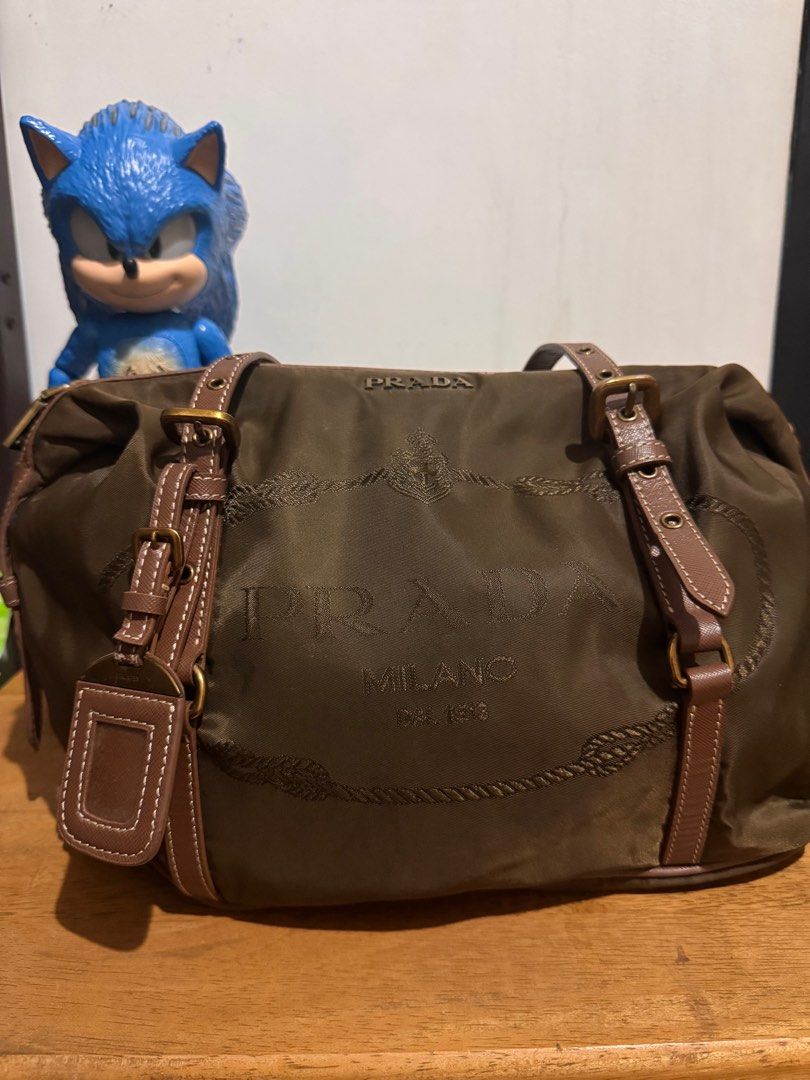 Prada brown canapa SUPER SALE UNTIL TOM ONLY (Category: Luxury Bags & Wallets) located in Manila. Submitted by buzzbuystarphalange (Listing ID 1372202537, Image 2). Description: .