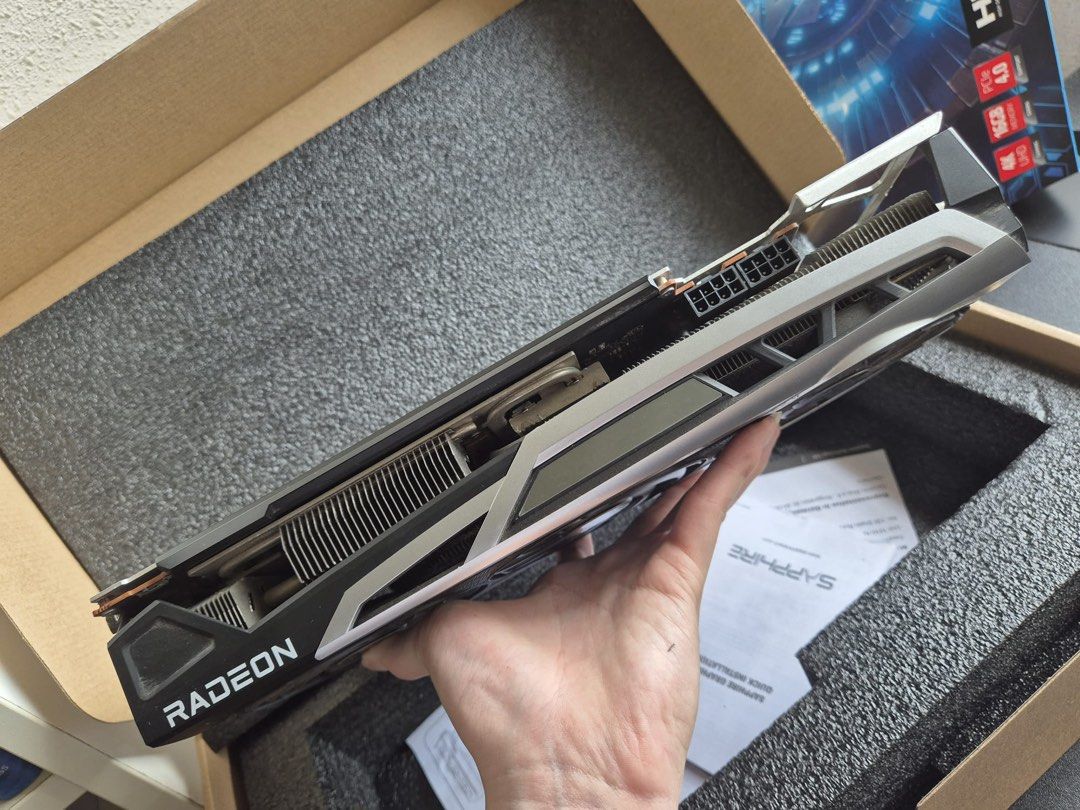 Sapphire Nitro+ AMD Radeon RX 6800 XT Special Edition (Category: Computer Parts) located in Singapore. Submitted by gpusolutions (Listing ID 1372181321, Image 3). Description: Sapphire Nitro+ AMD Radeon RX 6800 XT Limited Edition (Used, Excellent Condition) Selling off to cut loss – bought during peak period but never used for mining. Only used briefly for general tasks, then stored. No longer needed. Specs: • GPU: AMD Radeon RX 6800 XT • VRAM: 1