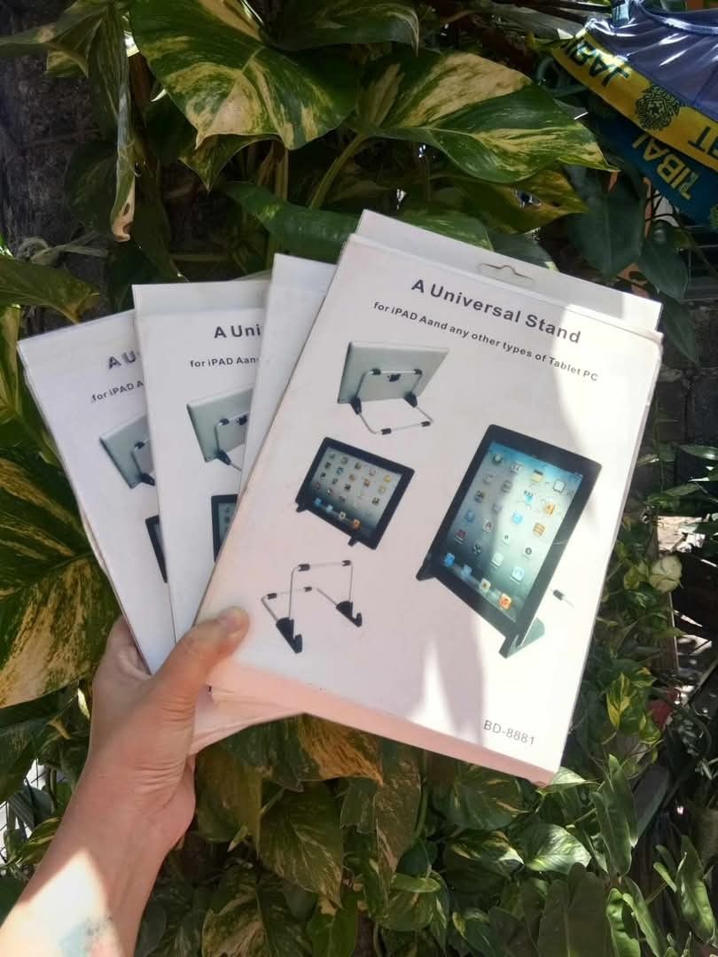 Universal tablet stand (Category: Mounts & Holders) located in Quezon City. Submitted by rigelsfashiononline (Listing ID 1372217297, Image 1). Description: 4pcs.available.