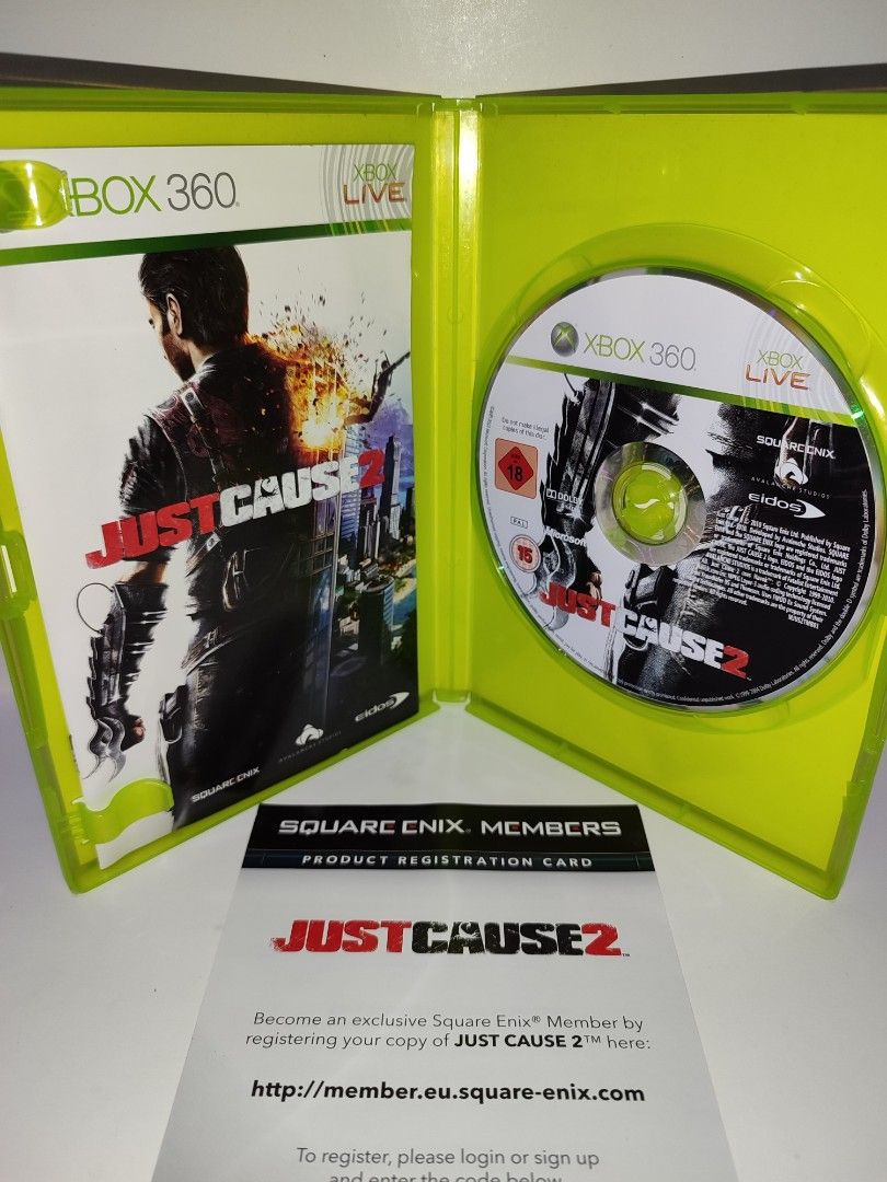 XBOX 360 - Just Cause 2 (PRE-OWNED) "OPEN REGION" (Category: Xbox) located in Mendez-Nunez. Submitted by sf2_gameshop (Listing ID 1372130655, Image 3). Description: PLEASE READ: Open region, the disc will work on any Xbox 360 units. PAL - √ (Yes) NTSC/J - √ (Yes) NTSC/UC - √ (Yes) CONDITION: Pre-owned item.Tested working. Please see posted photos for the disc condition. It comes with a game manual. GENRE: Action adventure MODE: Single-player REGI