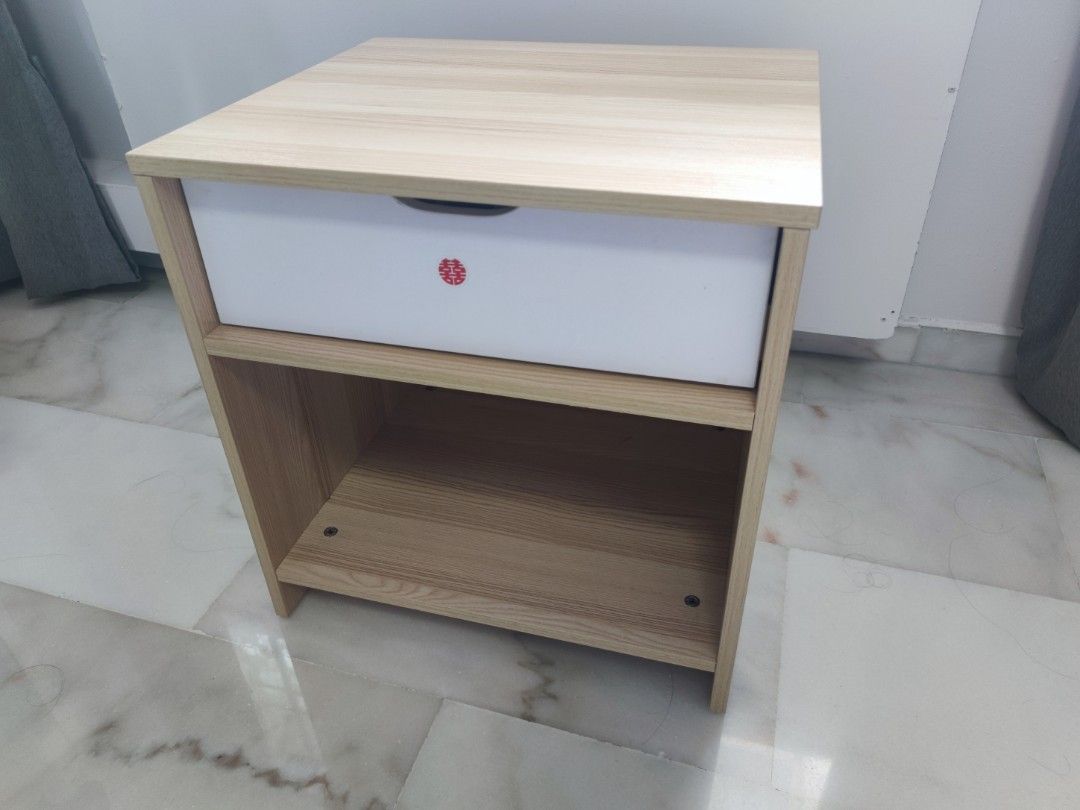 Bedside Table (Category: Tables & Sets) located in Singapore. Submitted by benedict80 (Listing ID 1367229497, Image 2). Description: 48 cm length * 42 cm depth * 50 cm height new with no flaws one drawer.