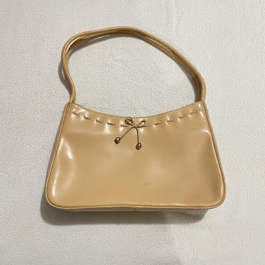 Beige Lancaster Paris High end kili bag (Category: Shoulder Bags) located in Cavite. Submitted by koricat (Listing ID 1367269817, Image 2). Description: ᯓᡣ𐭩 Condition 10/10 (super linis) MOP: Gcash MOD: Direct JnT.