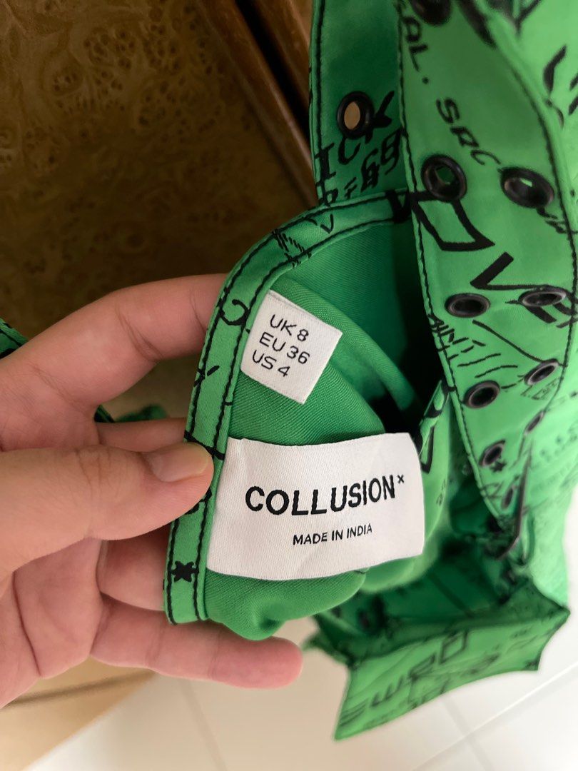 Collusion Cyber Dress (Category: Dresses) located in Singapore. Submitted by cokechoke (Listing ID 1367242234, Image 3). Description: If you like something a little loud and unique, this is for ya! Worn only once, condition as good as new. Comes with a belt which features a pouch. Size UK 8. .