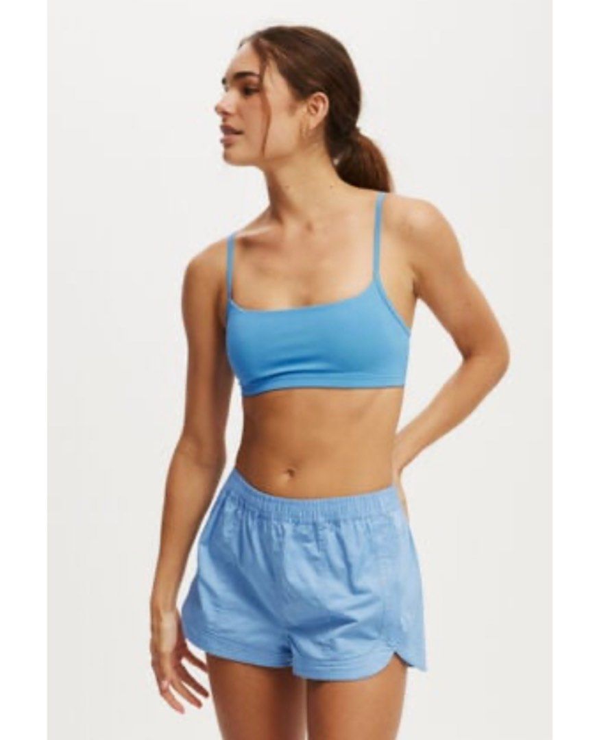 cotton on workout yoga crop in tranquil blue (Category: Activewear) located in Singapore. Submitted by stonkyard (Listing ID 1367158023, Image 1). Description: brand new without tag adjustable straps removable foam cup inserts .
