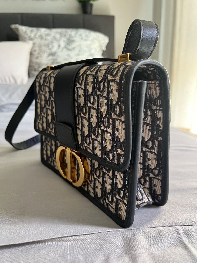 Dior 30 Montaigne Shoulder Bag (Category: Luxury Bags & Wallets) located in Taguig. Submitted by pamela_repotente (Listing ID 1367236014, Image 3). Description: Dior 30 Montaigne Shoulder Bag, in Blue Oblique Jacquard print. Slightly used. With Dust Bag..