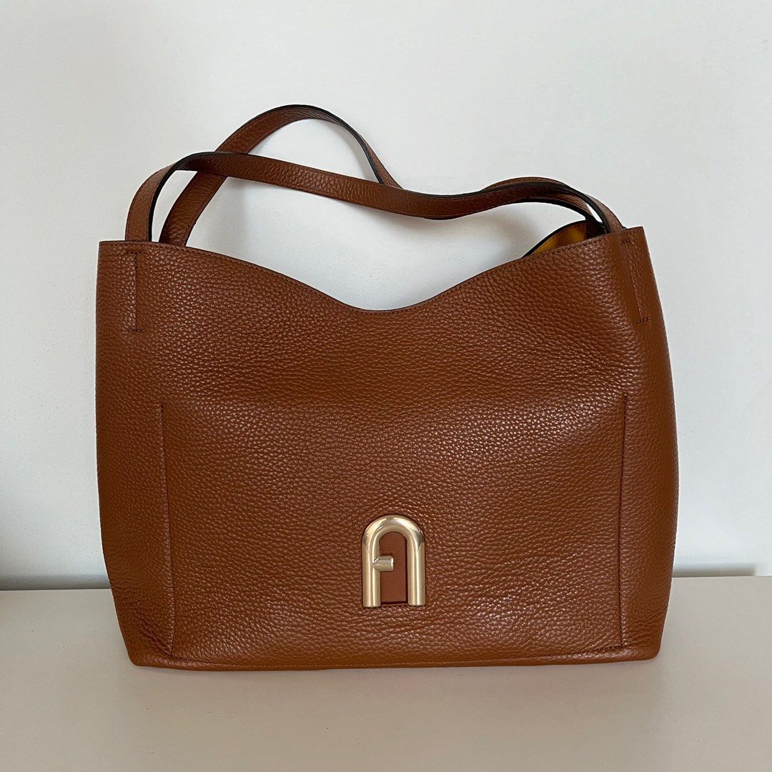 Furla Hobo Bag (Category: Luxury Bags & Wallets) located in Iloilo. Submitted by ifrancesanne (Listing ID 1367240799, Image 1). Description: .