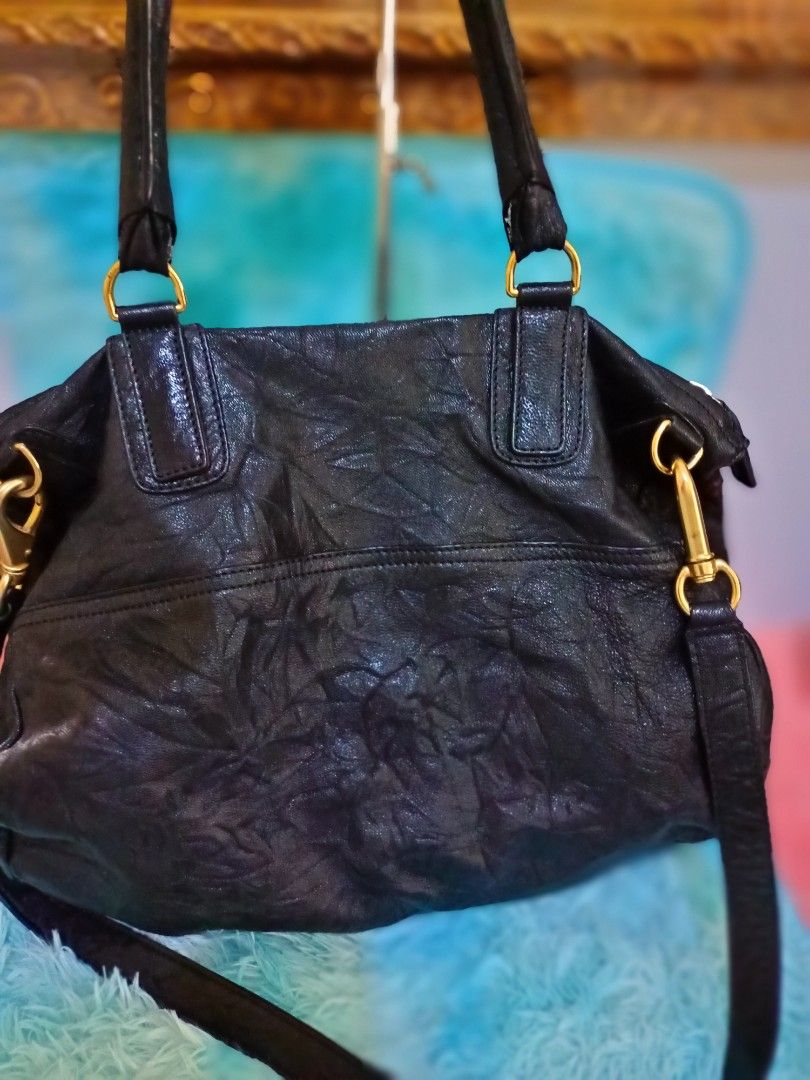 Givenchy Pandora (Category: Luxury Bags & Wallets) located in Santo Tomas. Submitted by mybellacloset158 (Listing ID 1367250889, Image 2). Description: Givenchy Pandora Soft Genuine Leather Large size Actual Photo posted *Issue missing letter" Y" that's why I selling it in a Low price, other than that the bag is still in good condition. Disclaimer: I am not affiliated, associated, authorized by, or in any way officially connected on the posted pr