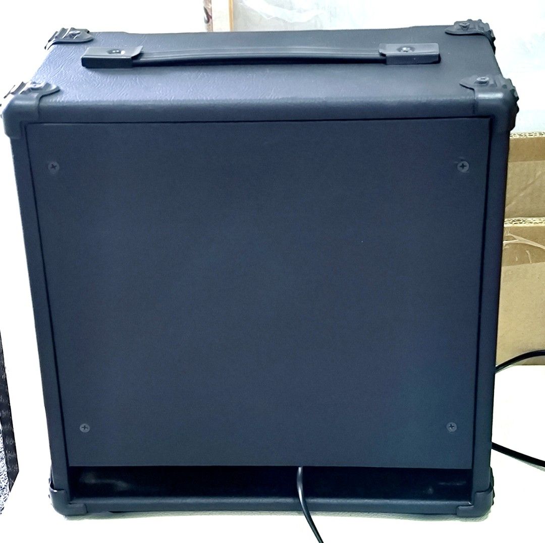 GUITAR AMPLIFIER SERIES (Category: Other Audio Equipment) located in Singapore. Submitted by elwin.lee.31 (Listing ID 1367104232, Image 3). Description: GUITAR AMPLIFIER SERIES I'm selling it for a friend.I don't know much about this product. If you understand, you can buy it if you need it. Description Electric guitar amplifier. 6 inch Speaker. There are 2 inputs and 1 output. Great quality. Dimensions/body size: 34×34×19 cm.
