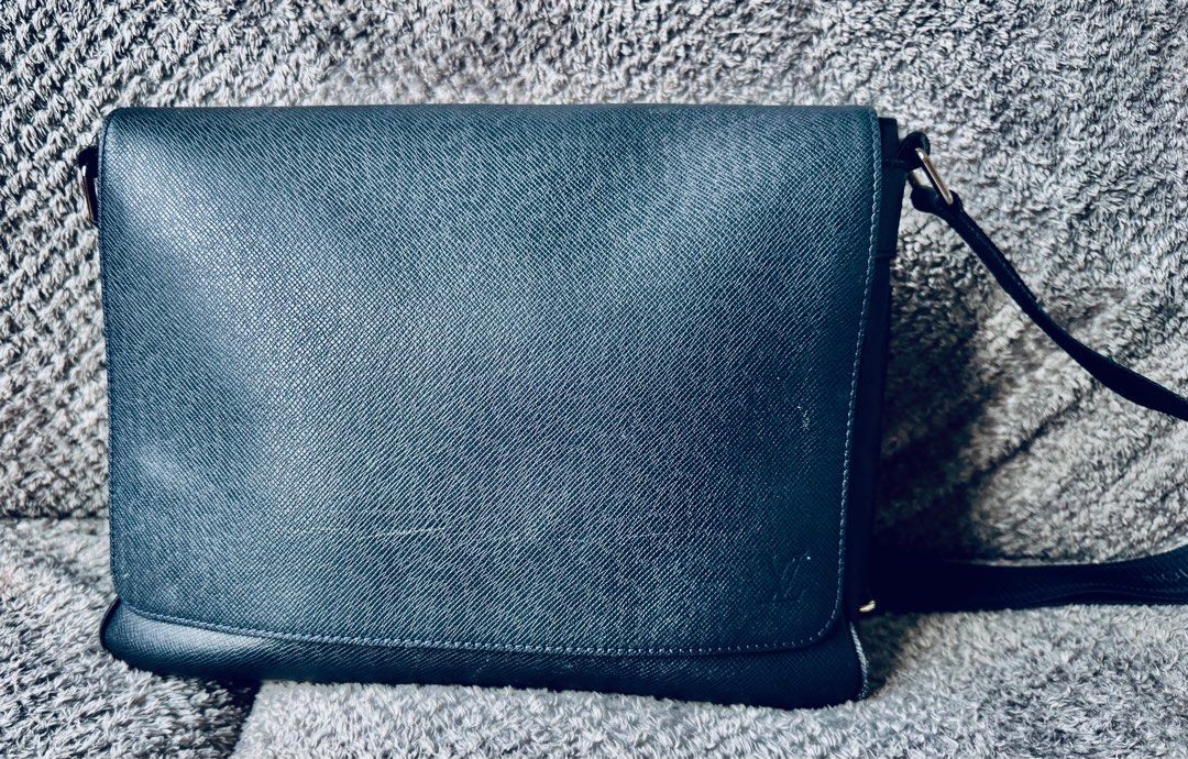 Louis Vuitton Blue Taiga Leather Bag (authentic) (Category: Bags & Wallets) located in Singapore. Submitted by BruceB (Listing ID 1367185618, Image 1). Description: Bought in MBS LV shop.Good condition as hardly worn. Has some light scratches from use however not cosmetically disturbing. Can provide more pics at request. Authenticity Guaranteed. New costs 2800$ Condition: 8/10 - minimal signs of wear with no stains or smell. Dimensions: 32 x 26 x