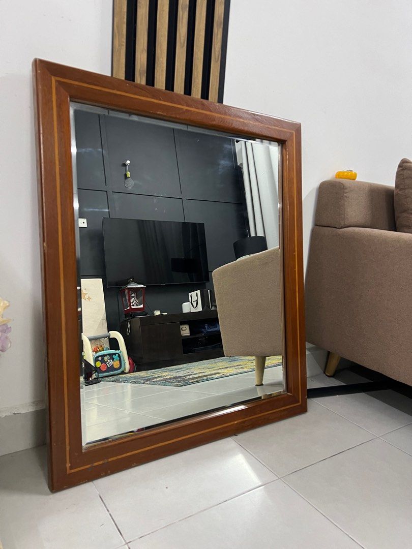 Mirror (Category: Other Home Furniture) located in Johor Bahru. Submitted by HereAndTherePanda (Listing ID 1367228564, Image 1). Description: Solid wood Mirror Measurement: 90(L) x 80(W) Solid wood. Super heavy. Mint condition. Reason for sale: Moving house.