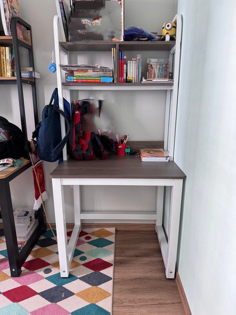 Study table (Category: Tables & Sets) located in Singapore. Submitted by el_0424 (Listing ID 1366784595, Image 2). Description: Brand new table. Only fix it up. But kids don like to use it. Take it as it is. Self pick up. Please arrange your own transportation. Open for negotiation. Table is 80cm long Actual colour is the last picture. Dark walnut colour top.
