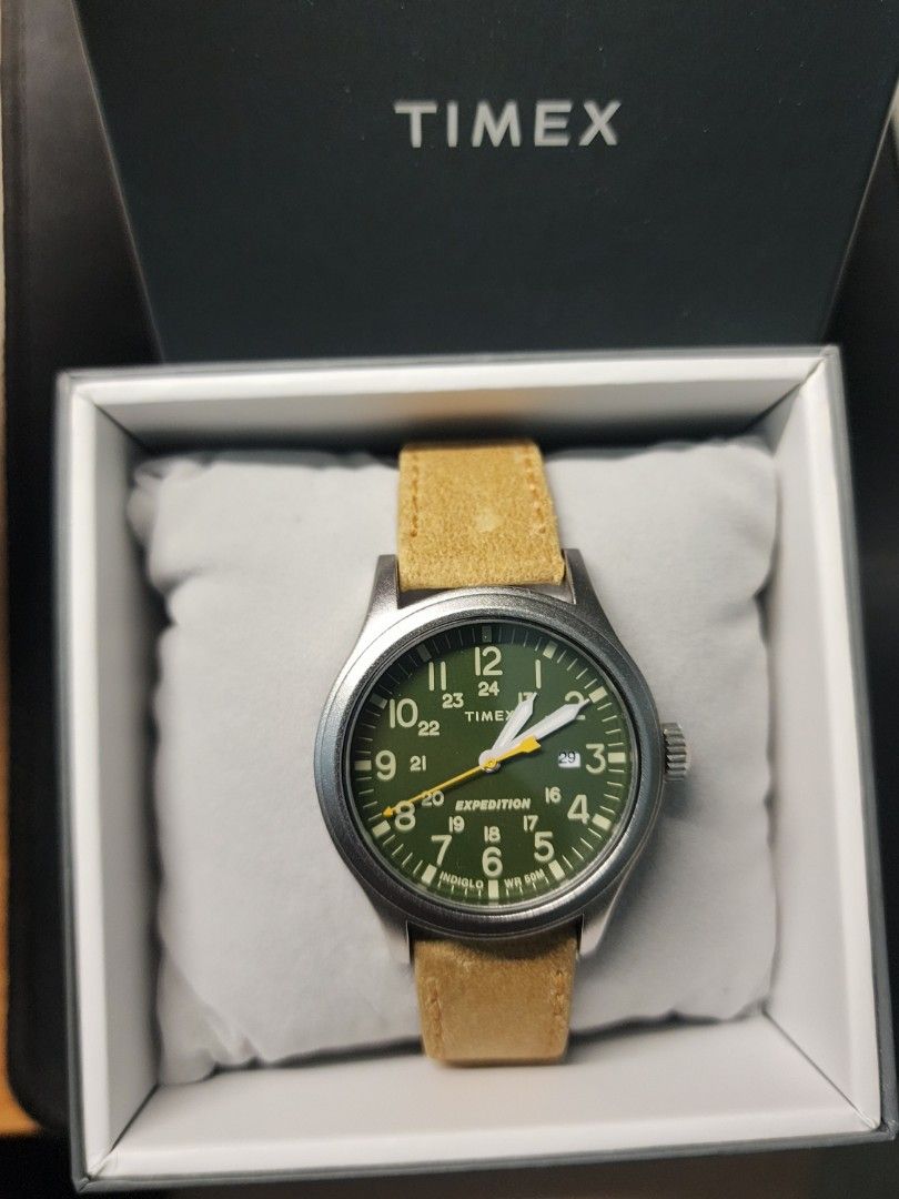 Timex Expedition Scout Date 40mm Leather Band (Category: Luxury Watches) located in Paranaque City. Submitted by yhandeclutters (Listing ID 1367278342, Image 2). Description: Model number: TW4B23000 - Purchased from Watch Republic at SM Southmall in 2023 - Original leather strap. Comes with box and papers. - Used twice and stored since. - 40m dial, quartz Dial colour: Green Strap colour: Brown RFS: Not being used Shipping Fee shouldered by buyer 