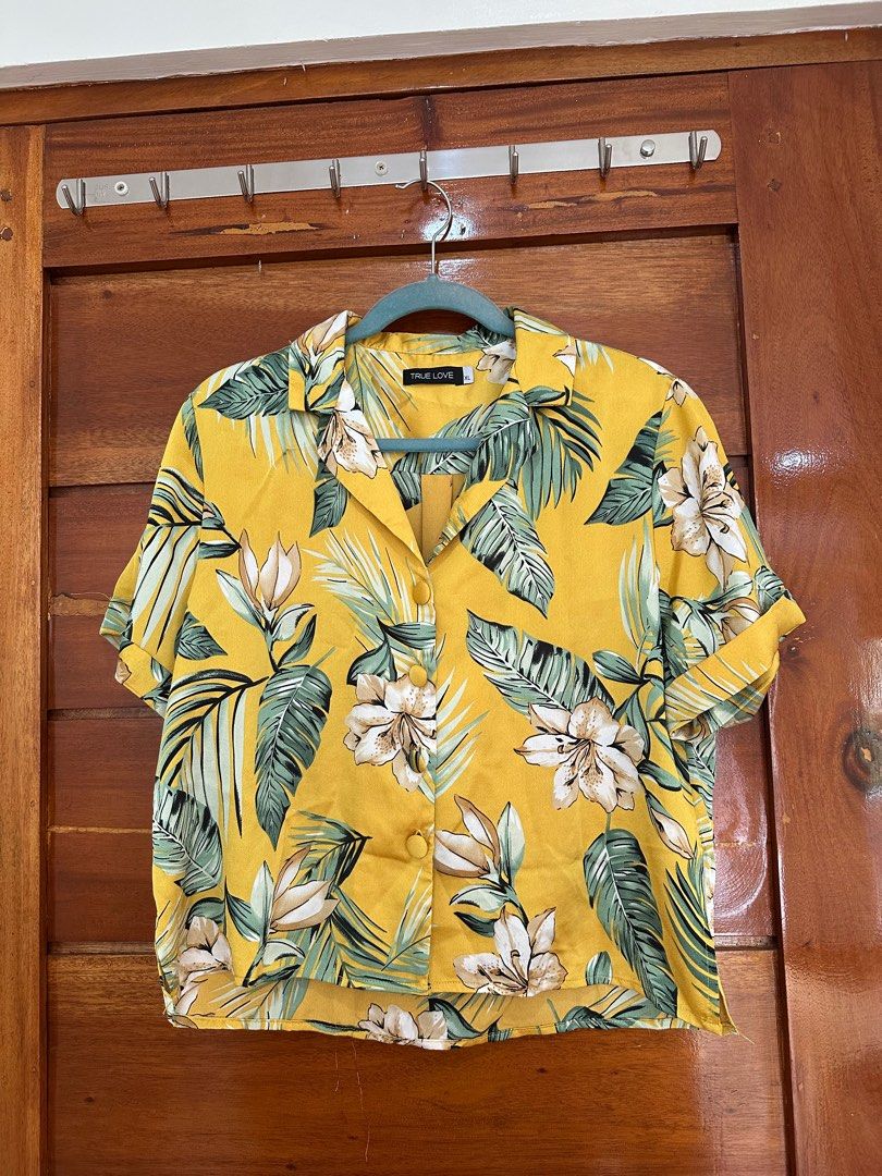 Yellow summer button down polo (Category: Blouses) located in Caloocan City. Submitted by mnl.seconds (Listing ID 1367123807, Image 1). Description: .