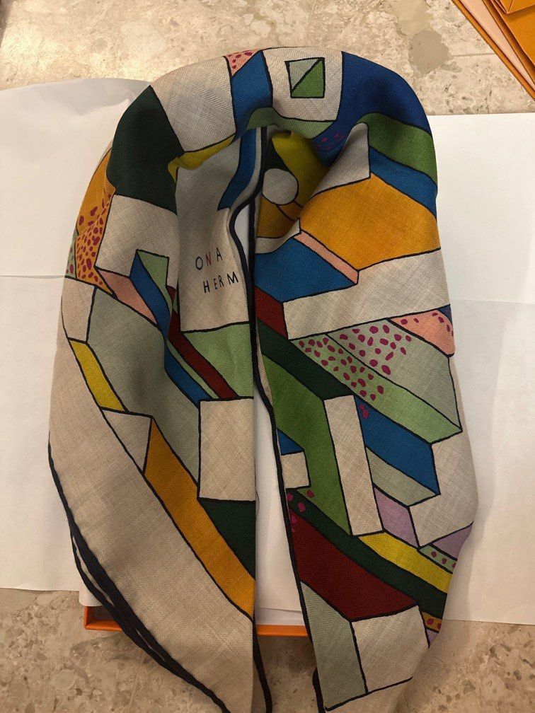 Authentic Hermes Scarf Triangle Cashmere/Silk (Category: Luxury Accessories) located in Quezon City. Submitted by breakmyfashion (Listing ID 1367372075, Image 1). Description: Material: 70% cashmere 30% silk Giant triangle in cashmere and silk with hand-rolled edges. Printed on our iconic cashmere and silk material, this giant triangle scarf is supple, lightweight and easy to wear Made in France Designed by Nigel Peake Dimensions: L 188 x H 94 cm