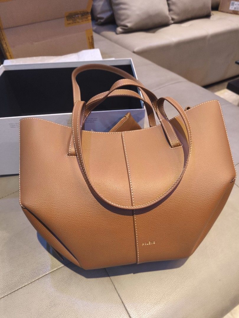 Authentic Polene Cyme Mini Textured Camel (Category: Tote Bags) located in Manila. Submitted by NouveauHomesPH (Listing ID 1367325762, Image 1). Description: Authentic Polene Cyme Mini in Textured Camel - On Hand - Brand New with Box, Dust bag, Care Cards - Box will be tied with our teal colored logo ribbon "Style Central" - Free Lalamove within Metro Manila - For meetups: Fishermall QC (7.30 pm Tuesday/Thursday), SM North (7.30 pm Monday/Sunday)