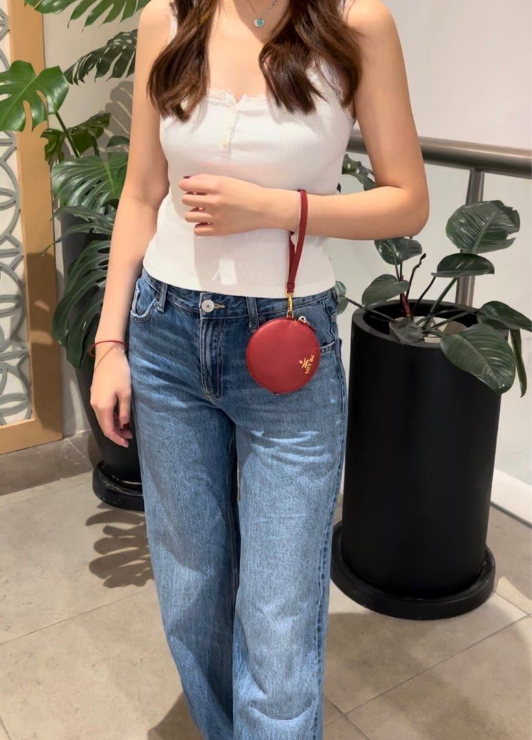 Authentic Preloved Prada Saffiano Round Wristlet with Gold Hardware (Category: Luxury Bags & Wallets) located in Quezon City. Submitted by tokyoluxestuff2013 (Listing ID 1345603370, Image 2). Description: LOWBALLERS WILL NOT BE ENTERTAINED 🚫 100% Guaranteed Authentic Comes with care card and box Excellent condition No discoloration Clean inside and out Onhand Shipping via LBC/Grab/Lalamove Add shipping fee No haggling No swapping Serious buyer o