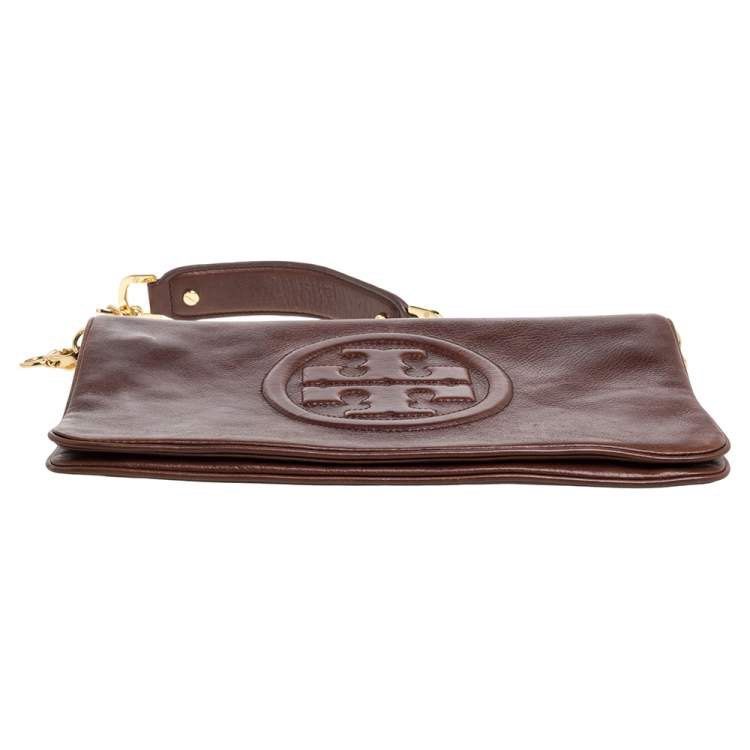 Authentic Tory Burch Bombe Reva Chain Clutch (Category: Luxury Bags & Wallets) located in Manila. Submitted by mokaaaaaaaa (Listing ID 1367472095, Image 3). Description: Authentic tory burch ‘Bombe Reva’ chain clutch in dark brown. There’s slight fading on the chain but barely noticeable! See last 2 pictures. Sobrang ganda ng leather mga sis 💯.