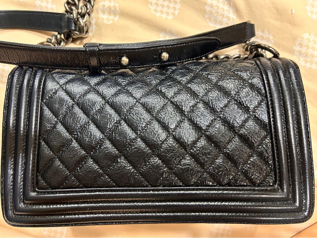 Black Patent Chanel Boy (Old Medium), Shoulder Bag (Category: Bags & Wallets) located in Singapore. Submitted by helloclearance (Listing ID 1366840029, Image 3). Description: 💯 authentic. Full set with box but no receipt. Authenticity card available. Very soft patent black with gun metal hardware. Keen pls pm. Slight negotiation can be discussed for this beautiful bag 🌟 .