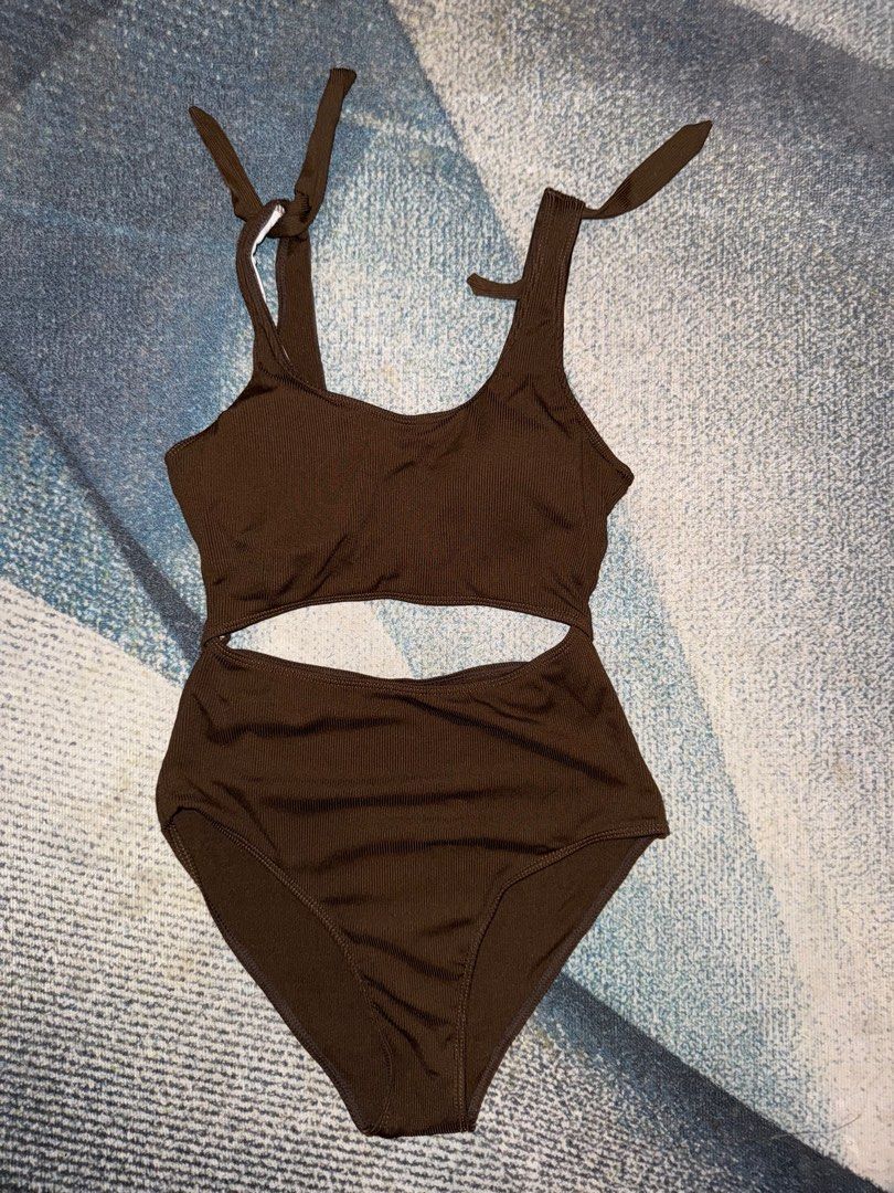 Brown Cut-out One Piece (Category: Bikinis & Swimsuits) located in Quezon City. Submitted by gutchiebb (Listing ID 1367370695, Image 1). Description: Fits small to medium rfs: decluttering loc: fairview qc.