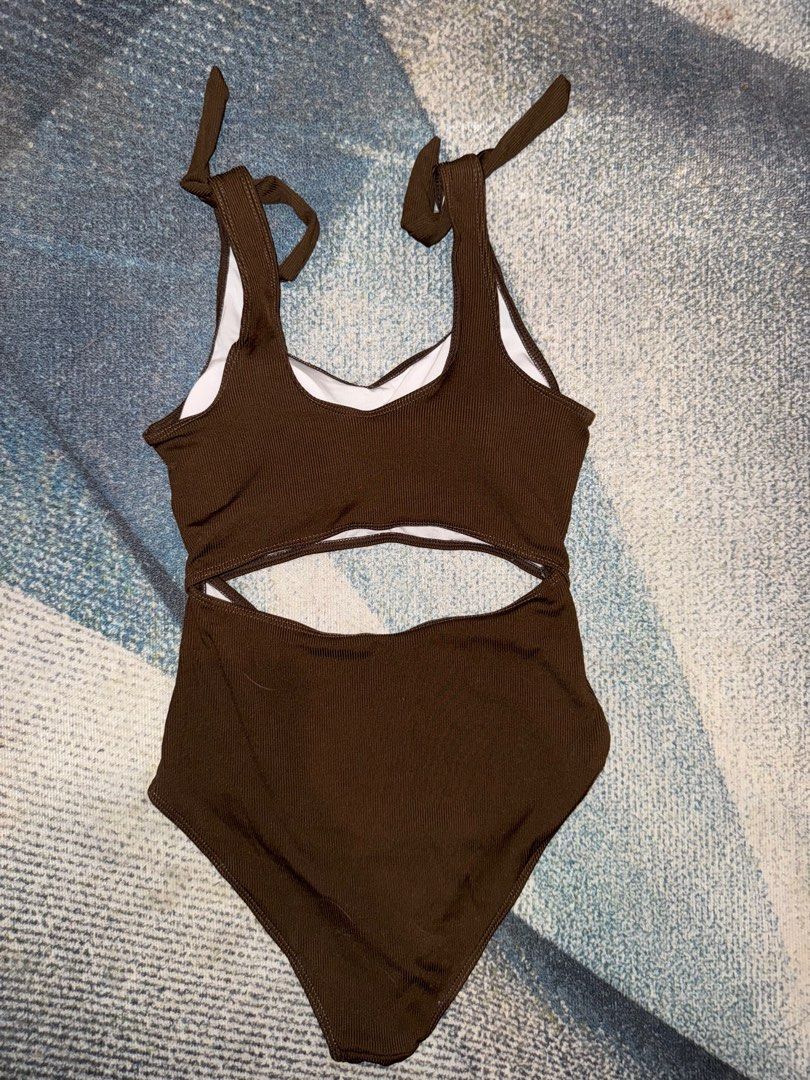 Brown Cut-out One Piece (Category: Bikinis & Swimsuits) located in Quezon City. Submitted by gutchiebb (Listing ID 1367370695, Image 2). Description: Fits small to medium rfs: decluttering loc: fairview qc.