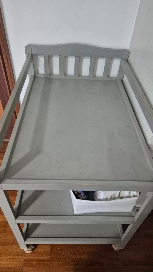 Changing table (Category: Changing Tables & Stations) located in Singapore. Submitted by aleksandranna (Listing ID 1367429351, Image 2). Description: changing table with lots of storage, on the wheels, but you can also block them. We'll used but in good condition, except for one dent (check pics) no other visible scratches, and this one will be covered by changing mat anyway. self pick up near Beauty World.