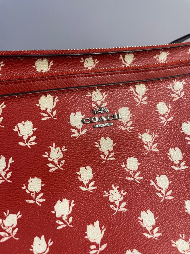 Coach 3-piece crossbody set (Category: Luxury Bags & Wallets) located in Makati City. Submitted by best.seconds (Listing ID 1367412234, Image 2). Description: 3-piece Coach cross-body bag with rose details. Used thrice only then stored. .