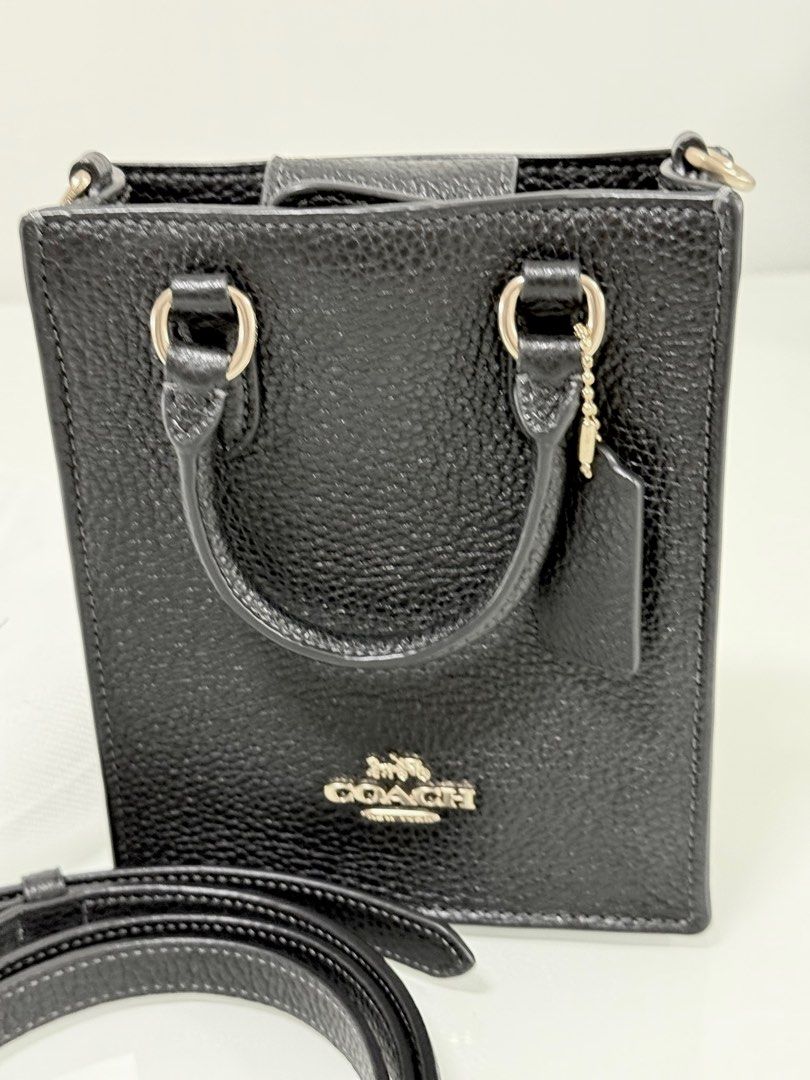 Authentic Coach Sling Bag (Category: Bags & Wallets) located in Singapore. Submitted by msbarang (Listing ID 1367342414, Image 1). Description: Selling $300 COD Bought from Japan in April 2025 Fits iPhone 16 pro max No trade, return or refund.