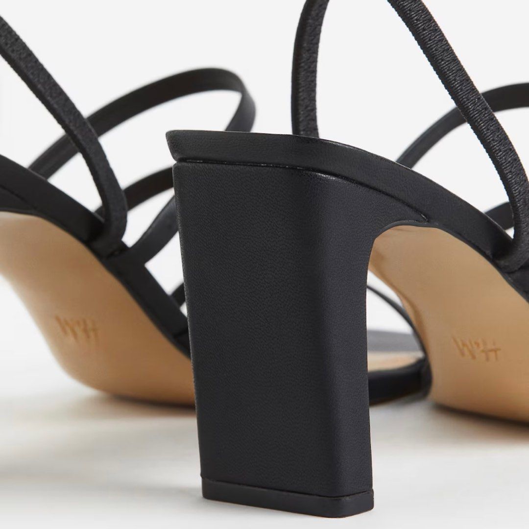 H&M Black Heels Sandals (Category: Heels) located in Cabanatuan. Submitted by yusitems (Listing ID 1367296795, Image 2). Description: Sandals with square toes, covered block heels and narrow straps over the foot. Heel height: 8cm 👠 Size: Euro 38 Original price: ₱1,690 Used once (for a few hours) no flaws! .