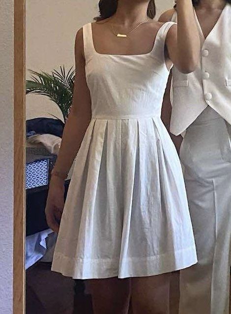 Love Bonito White Dress / Romper (Category: Dresses) located in Makati City. Submitted by ksclothes_ (Listing ID 1367197451, Image 1). Description: Looks like a dress but its actually shorts! Great condition Fits S.