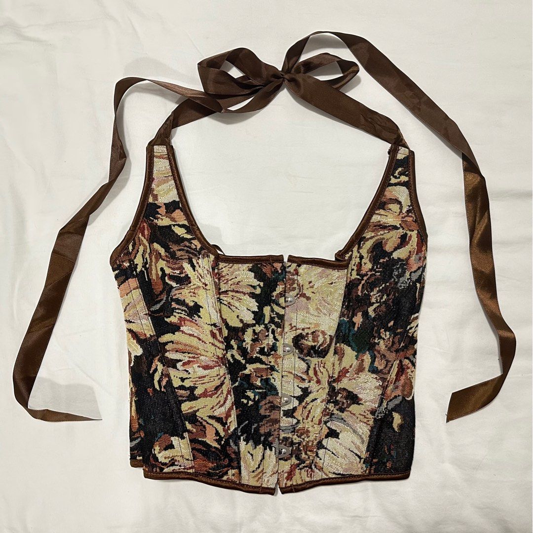 patterned corset (Category: Other Tops) located in Kuala Lumpur. Submitted by somos.amanos (Listing ID 1367478650, Image 2). Description: brown patterned thick fabric corset halter tie worn once front hooks, lace back has been tailored to make smaller but can be undone.