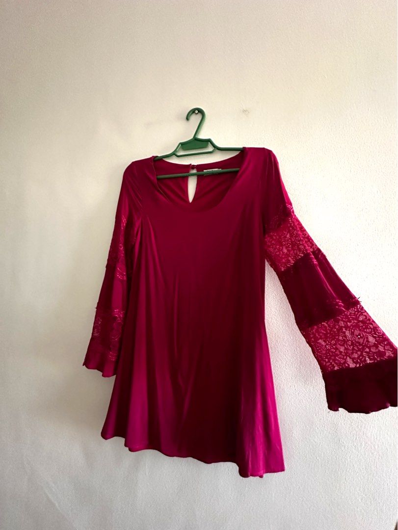 Pink Bell Sleeve Mini Dress (Category: Dresses) located in Makati City. Submitted by charm_style_items (Listing ID 1367329441, Image 3). Description: Tobi brand, size XS. This romantic burgundy dress features flared bell sleeves with lace panel detailing, a soft stretch fabric, and a keyhole back closure. Flowy, feminine, and flattering — perfect for date nights, dinners, or special occasions. Worn once, in excellent condition..