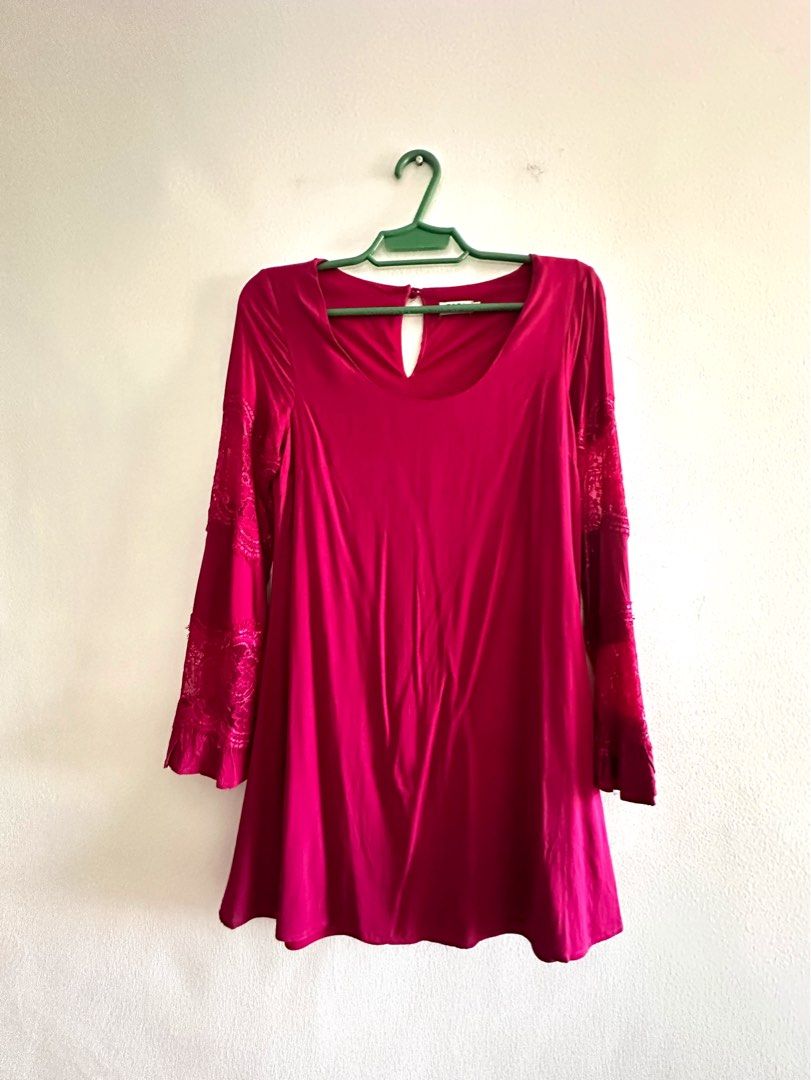 Pink Bell Sleeve Mini Dress (Category: Dresses) located in Makati City. Submitted by charm_style_items (Listing ID 1367329441, Image 2). Description: Tobi brand, size XS. This romantic burgundy dress features flared bell sleeves with lace panel detailing, a soft stretch fabric, and a keyhole back closure. Flowy, feminine, and flattering — perfect for date nights, dinners, or special occasions. Worn once, in excellent condition..