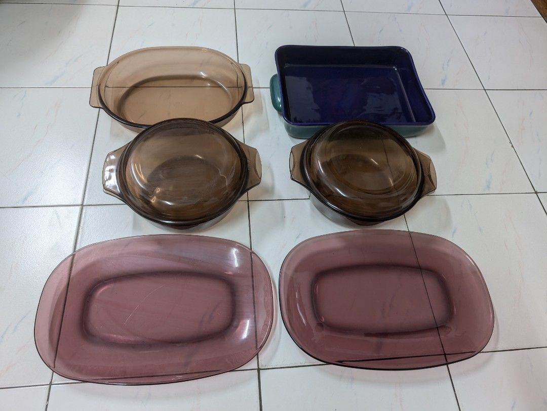 Pyrex Kitchenware (Category: Other Kitchen Appliances) located in Singapore. Submitted by solidgood (Listing ID 1367307100, Image 1). Description: Purple plate 37 cm length and 23.4 cm width Pyrex pot with cap (2 sets) 26 cm length, 22.5 cm width, 11 cm height Pot without cap 34 cm length and 24 cm width, 6 cm height Purple dark base plate 35 cm length and 25 cm width, 6 cm height 100$ for all + free delivery to your doorstep Item is brand new, n