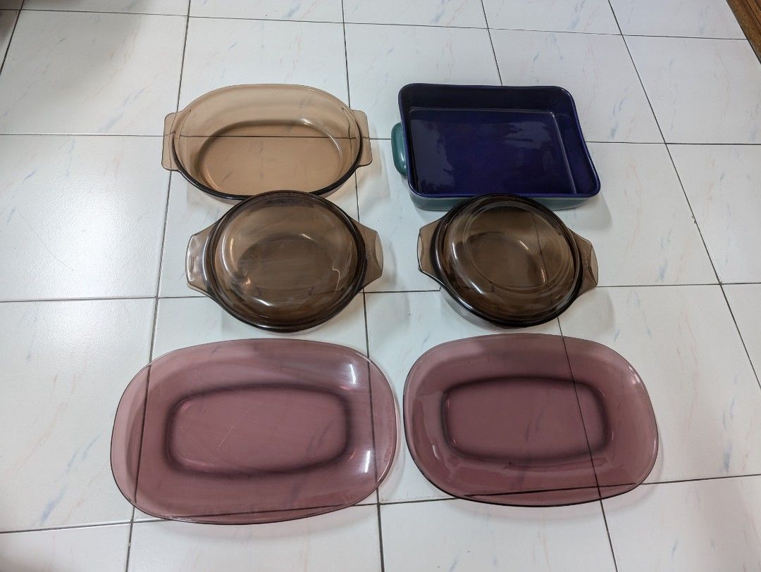 Pyrex Kitchenware (Category: Other Kitchen Appliances) located in Singapore. Submitted by solidgood (Listing ID 1367307100, Image 2). Description: Purple plate 37 cm length and 23.4 cm width Pyrex pot with cap (2 sets) 26 cm length, 22.5 cm width, 11 cm height Pot without cap 34 cm length and 24 cm width, 6 cm height Purple dark base plate 35 cm length and 25 cm width, 6 cm height 100$ for all + free delivery to your doorstep Item is brand new, n