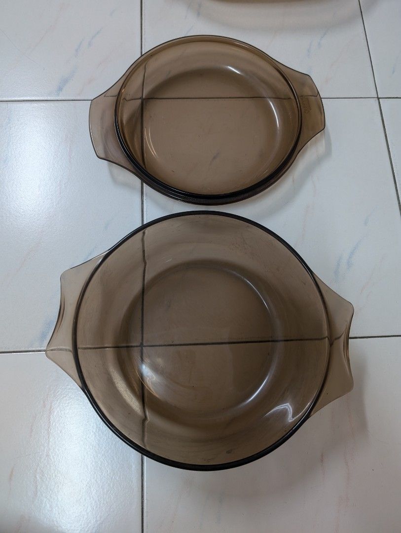 Pyrex Kitchenware (Category: Other Kitchen Appliances) located in Singapore. Submitted by solidgood (Listing ID 1367307100, Image 3). Description: Purple plate 37 cm length and 23.4 cm width Pyrex pot with cap (2 sets) 26 cm length, 22.5 cm width, 11 cm height Pot without cap 34 cm length and 24 cm width, 6 cm height Purple dark base plate 35 cm length and 25 cm width, 6 cm height 100$ for all + free delivery to your doorstep Item is brand new, n