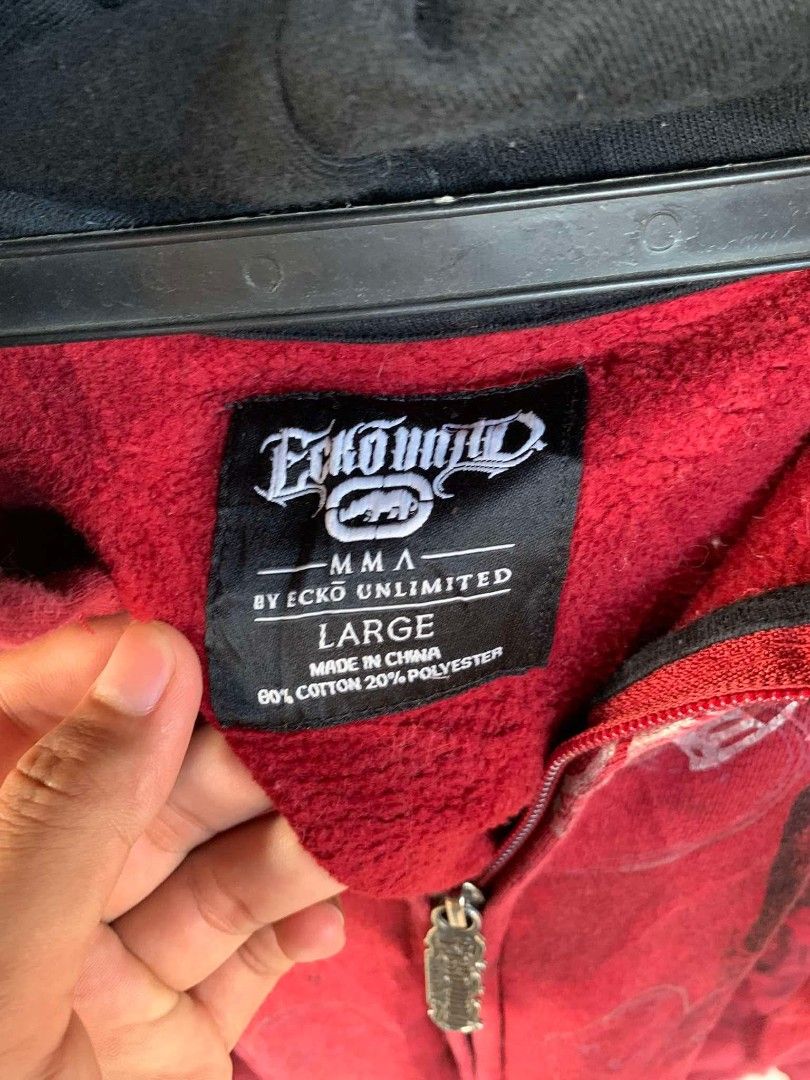 RARE ECKO UNLTD MMA HOODIE (Category: Hoodies) located in Baguio. Submitted by acexzzz (Listing ID 1367476095, Image 3). Description: Wts my Rare and Hard to find Ecko Untld Mma Zip Up Hoodie🩸🩸 -Never seen in any market before. -hard and heavy quality material, no issues at all possibly deadstock condition. Dimensions: W-25" L-28" Large on tag(perfect boxy fit) DO NOTE: - please manage your expectations because the item might be thrifted or use
