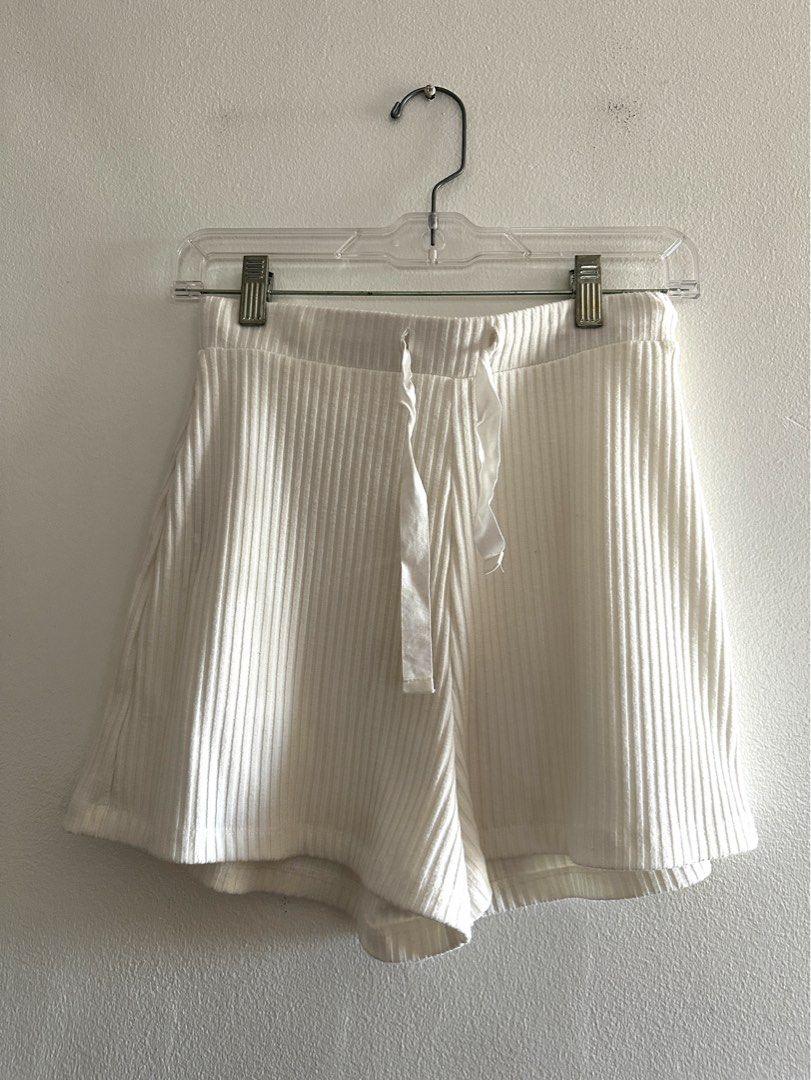 SALE: Mango loungewear shorts (Category: Shorts) located in Makati City. Submitted by charm_style_items (Listing ID 1367329127, Image 1). Description: Authentic Mango loungewear shorts in ribbed white — perfect for lounging or errands in style! Description: • Brand: Mango (MNG) • Size: EUR-USA S • Color: White (ribbed texture) • Details: Elastic waistband with adjustable ribbon tie, soft and breathable fabric • Condition: Barely used, excellent c