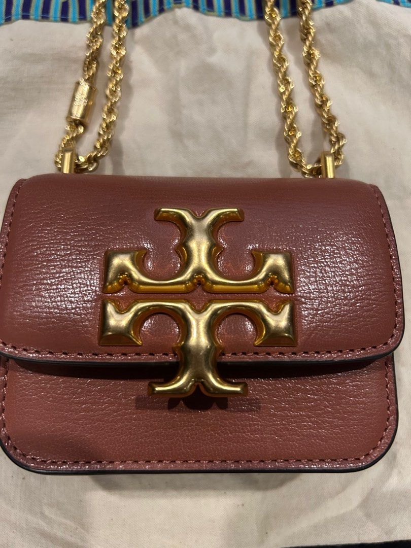 Tory Burch Mini Eleanor Convertible Flap Bag (Category: Luxury Bags & Wallets) located in Las Pinas. Submitted by skyeeyks (Listing ID 1367297461, Image 3). Description: Used 2x lang! Can pass as brand new! Gold hardware 10/10 :) May card slots inside and can fit mini make up cross body or shoulder! SRP: ₱26k .