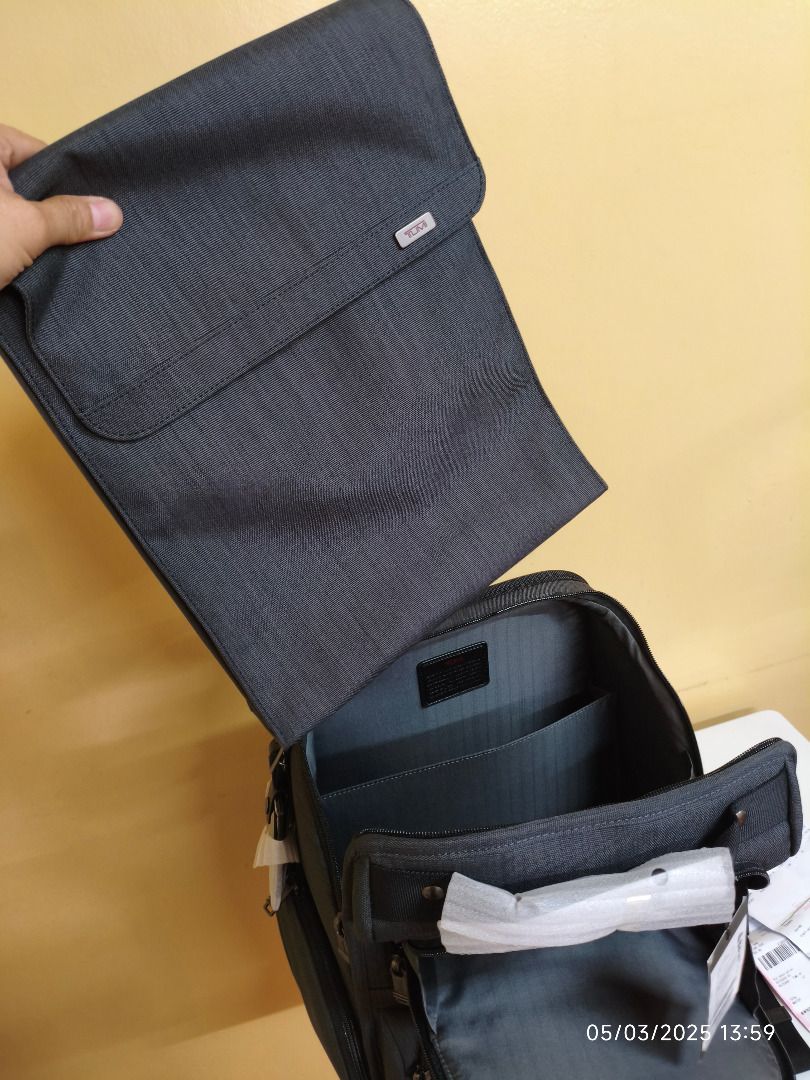 Tumi backpack bag (Category: Backpacks) located in Pasig City. Submitted by johnalvin (Listing ID 1367369766, Image 3). Description: Tumi Compact Laptop Brief Pack original from Tumi Store - Hong Kong backpack , with included laptop bag inside brand new , not used with : still attached pricetag , original plastic cover , original tumi black silk pouch will show you original receipt to prove authenticity location : Taytay , Rizal , Eastwood City (