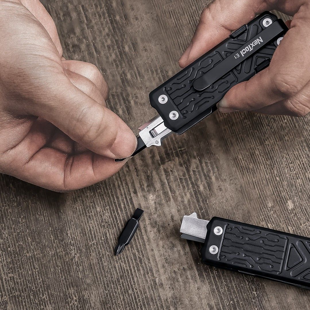 Nextool E1 Multi-Function Pocket Tool (Category: Hiking & Camping) located in Singapore. Submitted by macro_electronic (Listing ID 1367624588, Image 3). Description: << REVIEW VIDEO >> https://www.youtube.com/watch?v=7lxhjdmh644 << KEY FEATURES >> ✅ 10 practical tools in a compact form factor that fit your pocket perfectly; ✅ Patented large scissor with spring loaded for greater cutting power; ✅ Utility knife with replaceable blade; ✅ Convenient 