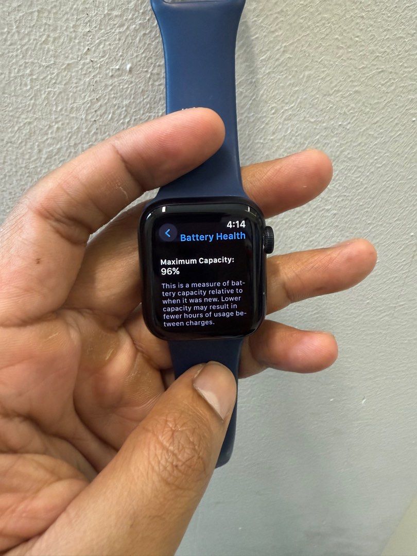 Apple Watch SE 40mm (Category: Wearables & Smart Watches) located in Singapore. Submitted by ryi6eeng2s (Listing ID 1367563984, Image 3). Description: Apple Watch SE GPS, 40mm, Midnight Aluminium case. Inclusive of original Nike Sports Loop(black/blue), original box, original charging cable. Will give other multiple different straps bought online. Battery health still very high at 96%. (battery health percentage higher and healthier than the rest