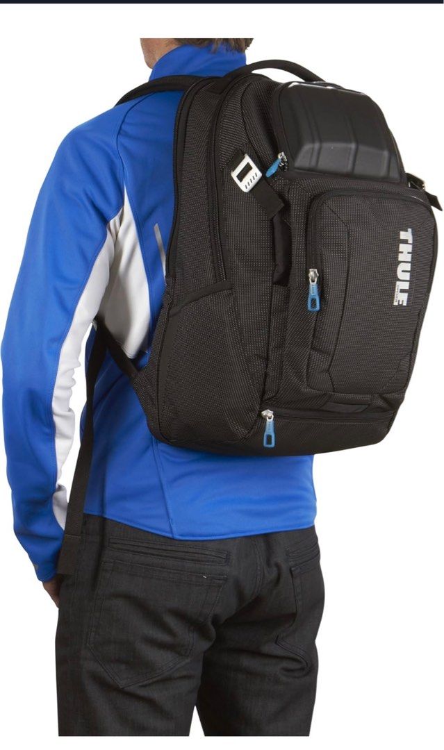 Backpack (Category: Backpacks) located in Singapore. Submitted by kharlzeis (Listing ID 1367621306, Image 9). Description: BNIT The Thule Crossover 32 L Backpack is a versatile, travel-and-commute bag built from durable dobby nylon, offering a dedicated, padded laptop sleeve (fits up to 17″ laptops), a crush-proof SafeZone compartment for fragile items, and smart organization pockets for documents, devices, and accessories ￼. It features ventilat