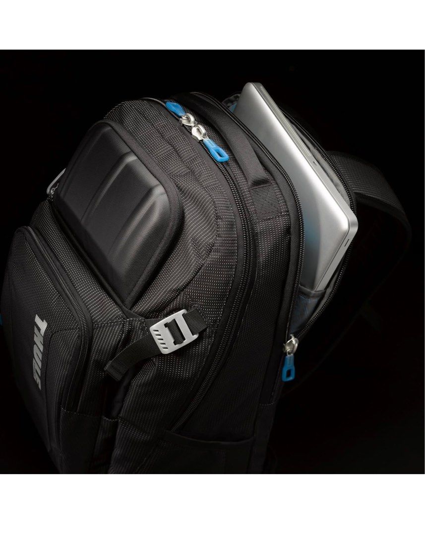 Backpack (Category: Backpacks) located in Singapore. Submitted by kharlzeis (Listing ID 1367621306, Image 7). Description: BNIT The Thule Crossover 32 L Backpack is a versatile, travel-and-commute bag built from durable dobby nylon, offering a dedicated, padded laptop sleeve (fits up to 17″ laptops), a crush-proof SafeZone compartment for fragile items, and smart organization pockets for documents, devices, and accessories ￼. It features ventilat