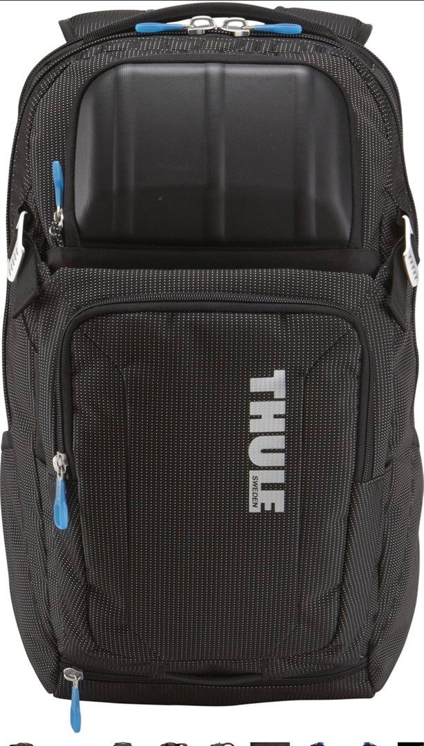 Backpack (Category: Backpacks) located in Singapore. Submitted by kharlzeis (Listing ID 1367621306, Image 3). Description: BNIT The Thule Crossover 32 L Backpack is a versatile, travel-and-commute bag built from durable dobby nylon, offering a dedicated, padded laptop sleeve (fits up to 17″ laptops), a crush-proof SafeZone compartment for fragile items, and smart organization pockets for documents, devices, and accessories ￼. It features ventilat