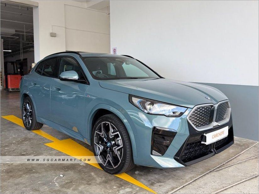 BMW iX2 Electric eDrive20 M-Sport Auto (Category: Used Cars) located in Singapore. Submitted by carchope (Listing ID 1367543902, Image 1). Description: 🚗Vehicle Features Electric motor producing 147bhp, Torque at 250Nm. Front wheel drive. Range up to 478km, 0-100km/h at 10.5sec.Top speed at 170km/h. 🚗Accessories Apple Carplay/Android Auto, Wireless charging, Navigation, Infotainment 10.7“ touchscreen, reverse camera ⭐️Accident free. ⭐️BMW agent