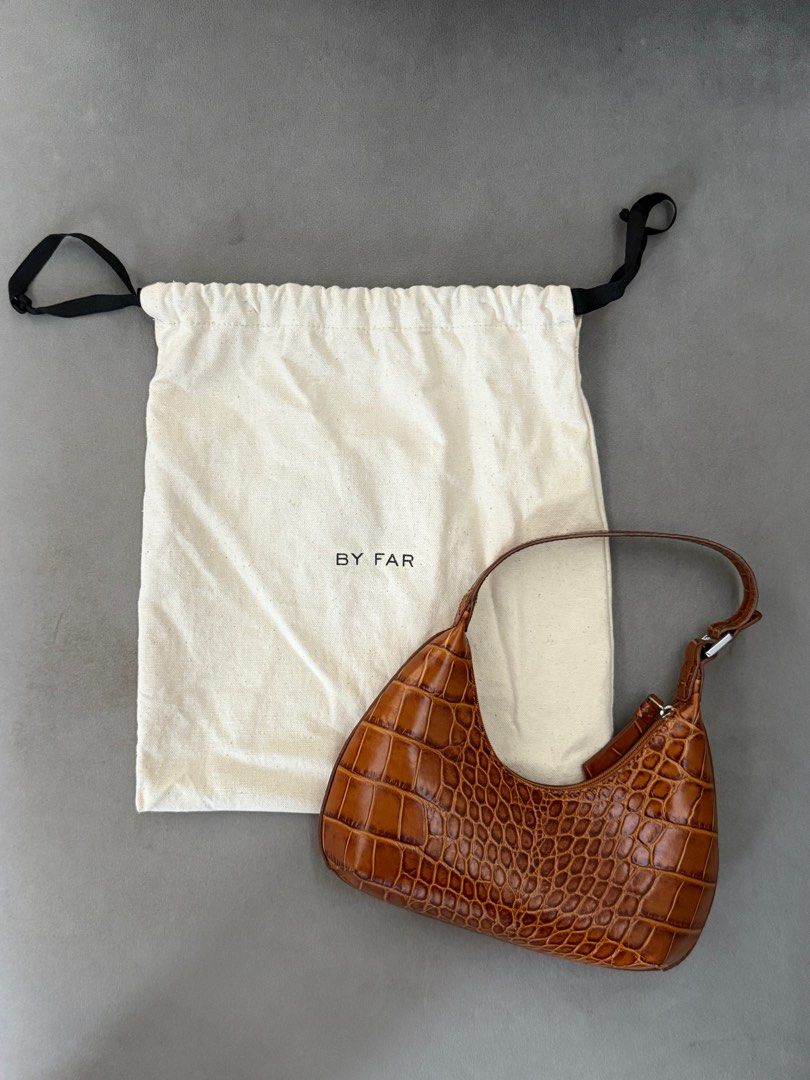 by Far Baby Amber Bag Tan Croc Embossed Leather (Category: Bags & Wallets) located in Singapore. Submitted by jazzy18 (Listing ID 1367581882, Image 1). Description: Seldom used. Still in pristine condition. 100% Cowhide Leather Lining: 100% Cotton.